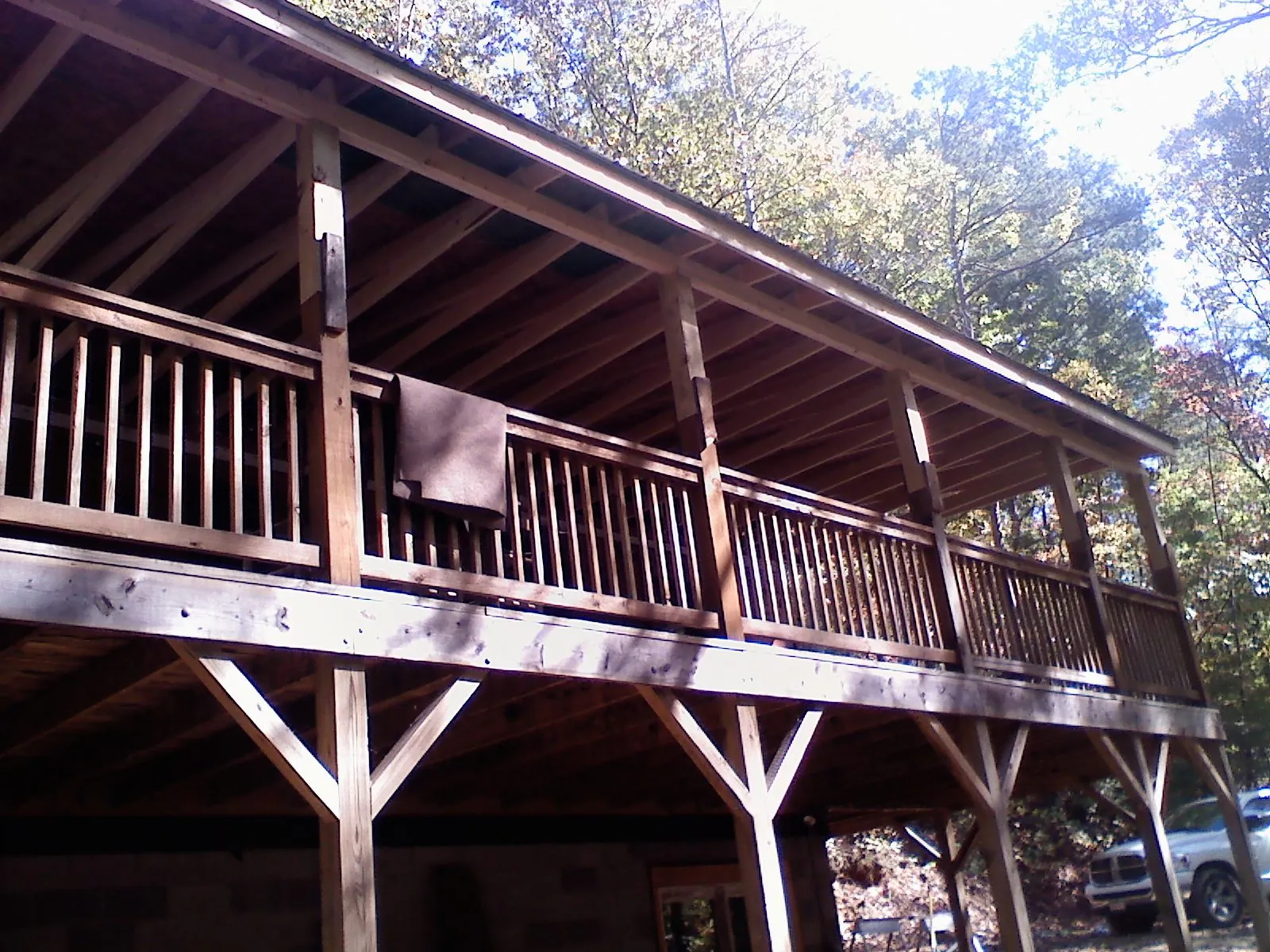 Timber framing under a new elevated porch and deck — Roof Leak Repair in Franklin by Roofing Brothers